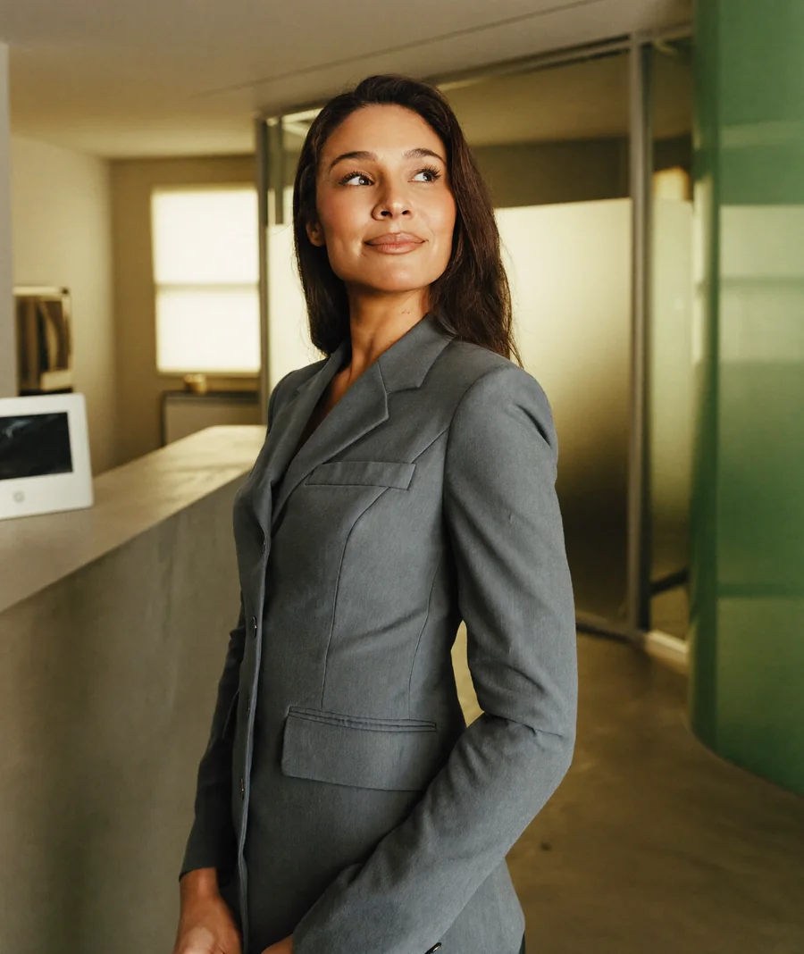 A wellness business owner in a modern clinic powered by MDside